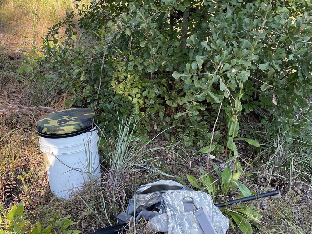 A seat is a good idea when dove hunting. It can be an elaborate folding chair or a simple 5-gallon bucket with a padded lid. The bucket is useful to haul shells, birds, decoys, water and other gear to and from the field. Author image.