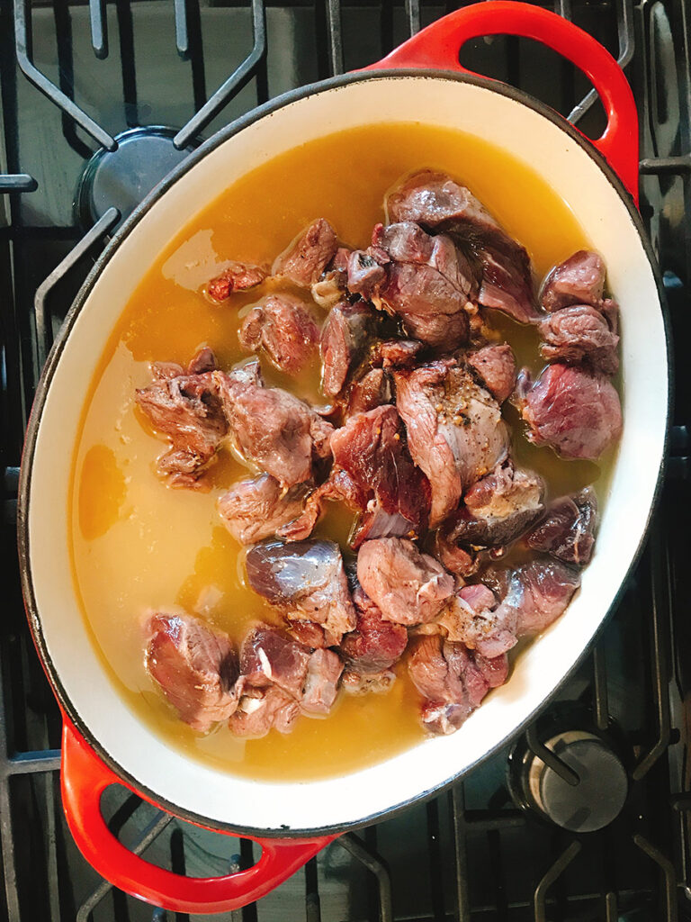 Starting confit covered in fat.